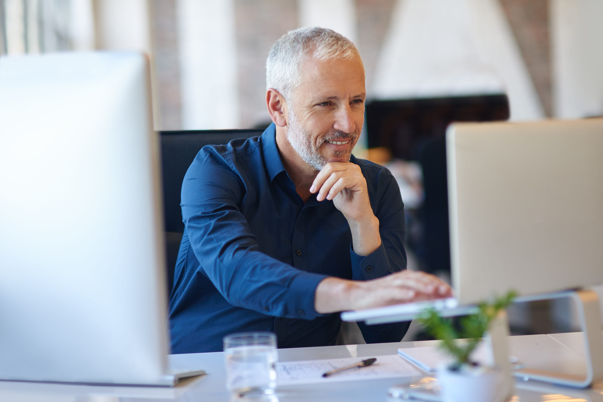 Cropped shot of a mature businessman working at his desk