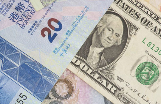 Multiple currency notes including US Dollar and Hong Kong Dollar